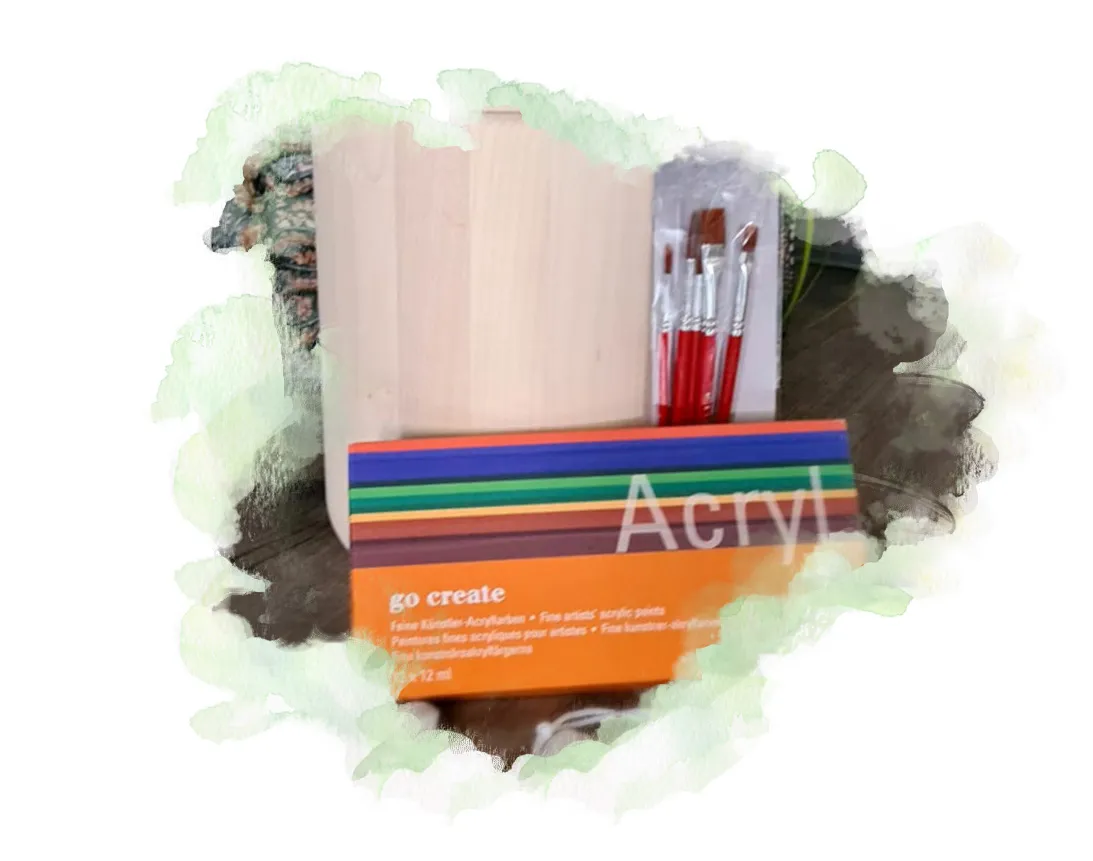 Acrylfarben und Pinsel zum kreativen Ausdruck der Kinder in der Trauerarbeit